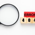 A picture of wooden block red and brown with the word Error 404