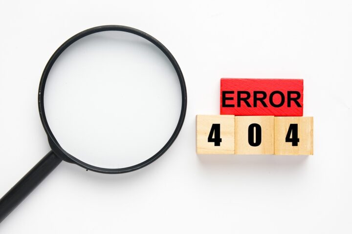 A picture of wooden block red and brown with the word Error 404